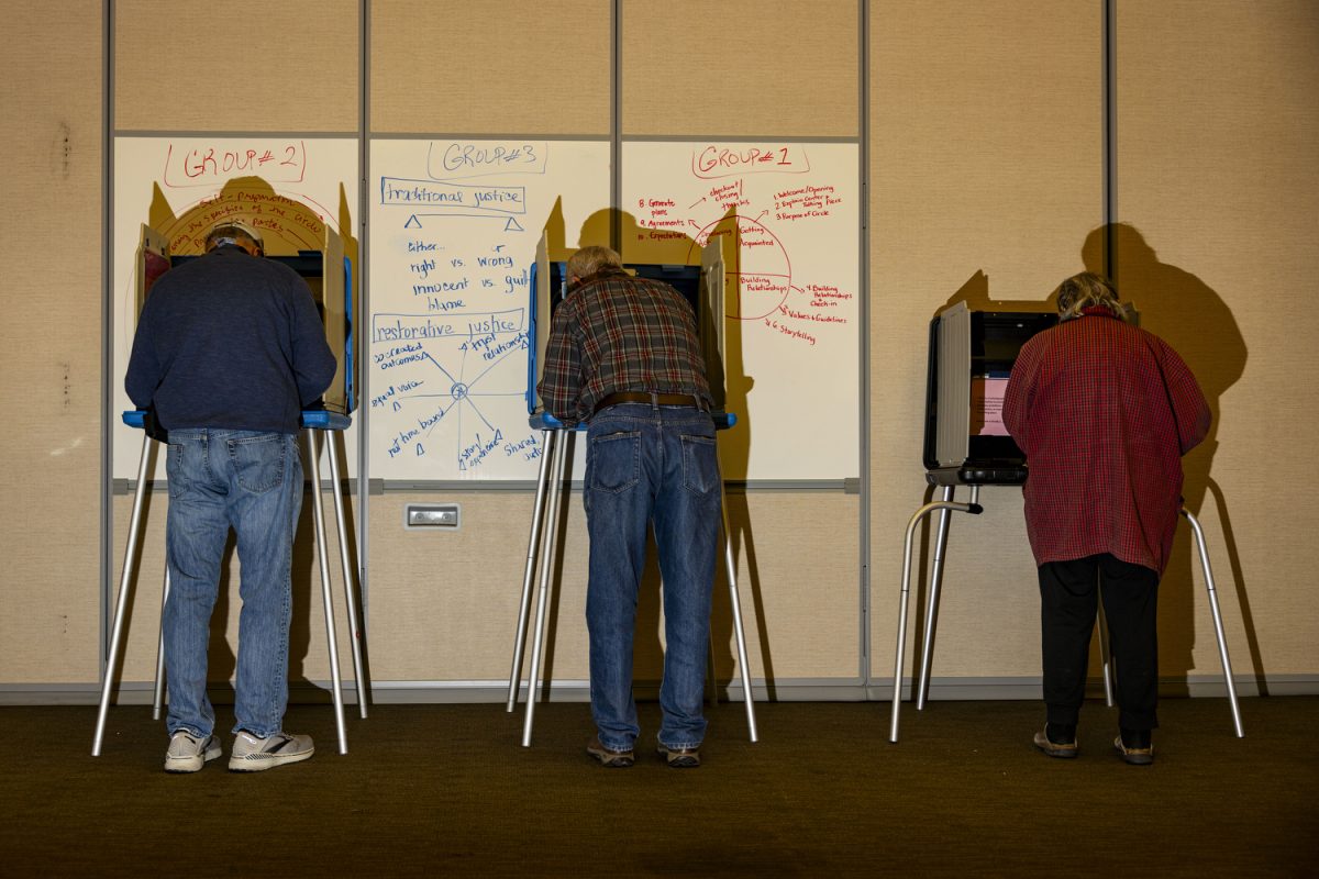 Iowa City voters vote at the Iowa City Community School District administration building on Dodge Street during Election Day on Tuesday, Nov. 7, 2023. Iowa City residents voted Tuesday for city and school board elections. Seven candidates are vying for four spots on the Iowa City Community School Board. Four seats are available on the Iowa City City Council and two At-Large, one District A, and one District C are also open. 