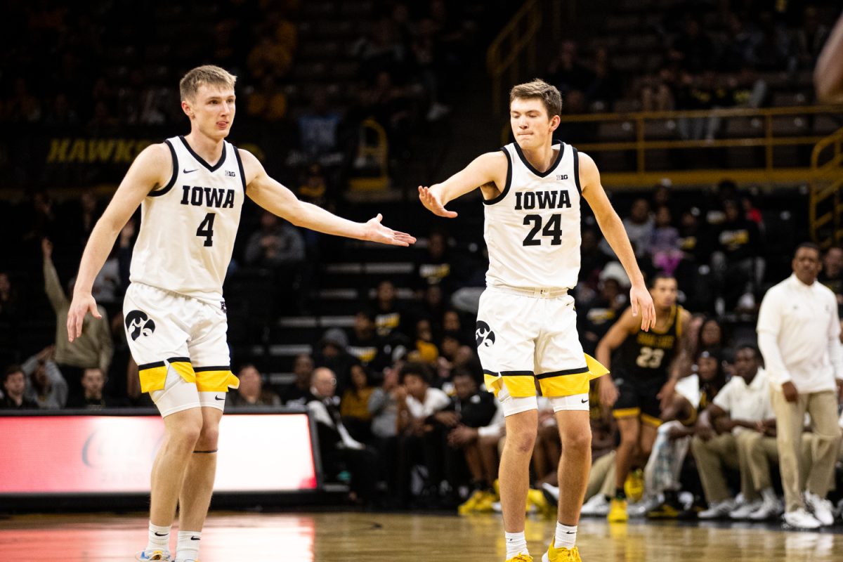 Iowa+Forward+Pryce+Sandford+high-fives+Iowa+Guard+Josh+Dix+after+making+a+three+during+a+men%E2%80%99s+basketball+game+between+Iowa+and+Alabama+State+at+Carver-Hawkeye+Arena+on+Friday%2C+Nov.+10%2C+2023.+The+Hawkeyes+defeated+the+Hornets+98-67.+Sandford+had+six+points+against+the+Hornets.