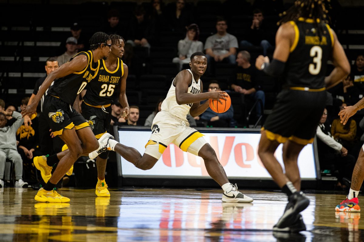 Iowa Forward Ladji Dembele steals the ball during a men’s basketball game between Iowa and Alabama State at Carver-Hawkeye Arena on Friday, Nov. 10, 2023. The Hawkeyes defeated the Hornets 98-67. Dembele had four rebounds against the Hornets.