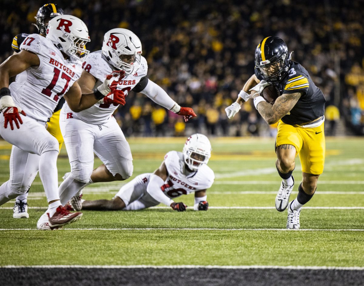 Iowa wide receiver Kaleb Brown runs into the end zone for a touchdown during a football game between Iowa and Rutgers at Kinnick Stadium on Saturday, Nov. 11, 2023. Brown received the ball three times for 27 yards and a touchdown. The Hawkeyes defeated the Scarlet Knights, 22-0.