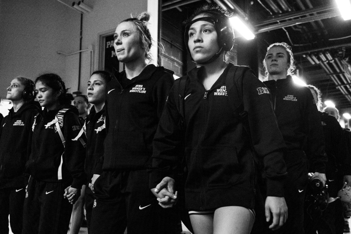 Iowa enters the arena during the Trailblazer Duals between No. 3 Iowa, No. 6 Sacred Heart, No. 13 Presbyterian, and No. 11 Lindenwood at Carver-Hawkeye Arena on Sunday, Nov. 12, 2023. Iowa women’s wrestling made history on Sunday, hosting the first women’s wrestling dual in Carver-Hawkeye Arena. The Hawkeyes defeated Presbyterian, 44-1, Lindenwood, 43-0, and Sacred Heart, 40-4. 