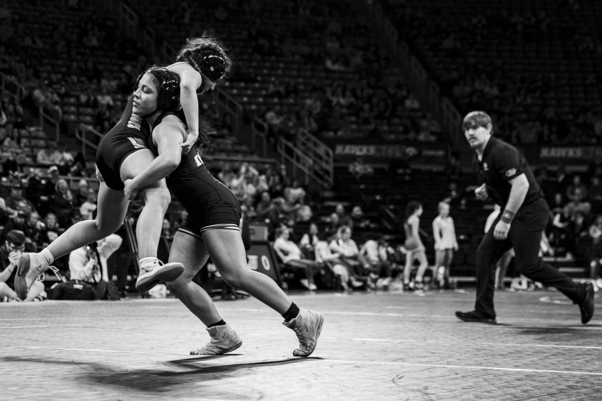 Iowa’s No. 12 116-pound Brianna Gonzalez wrestles Lindenwood’s Sienna Caruso during the Trailblazer Duals between No. 3 Iowa, No. 6 Sacred Heart, No. 13 Presbyterian, and No. 11 Lindenwood at Carver-Hawkeye Arena on Sunday, Nov. 12, 2023. Iowa women’s wrestling made history on Sunday, hosting the first women’s wrestling dual in Carver-Hawkeye Arena. Gonzalez defeated Caruso by tech fall, 10-0. The Hawkeyes defeated Presbyterian, 44-1, Lindenwood, 43-0, and Sacred Heart, 40-4.