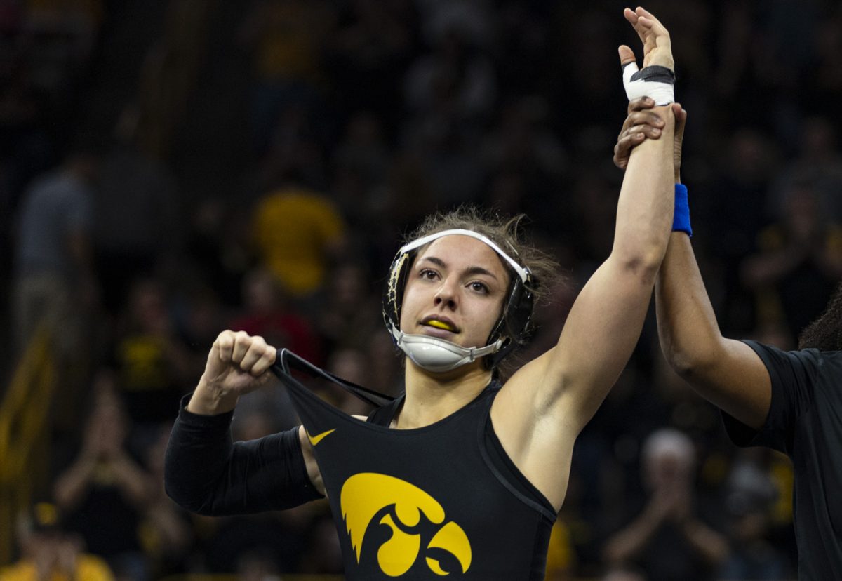 Iowa%E2%80%99s+130-pound+Lily+Luft+shows+off+the+tigerhawk+during+the+Trailblazer+Duals+between+No.+3+Iowa%2C+No.+6+Sacred+Heart%2C+No.+13+Presbyterian%2C+and+No.+11+Lindenwood+at+Carver-Hawkeye+Arena+on+Sunday%2C+Nov.+12%2C+2023.+Iowa+women%E2%80%99s+wrestling+made+history+on+Sunday%2C+hosting+the+first+women%E2%80%99s+wrestling+dual+in+Carver-Hawkeye+Arena.+The+Hawkeyes+defeated+Presbyterian%2C+44-1%2C+Lindenwood%2C+43-0%2C+and+Sacred+Heart%2C+40-4.+