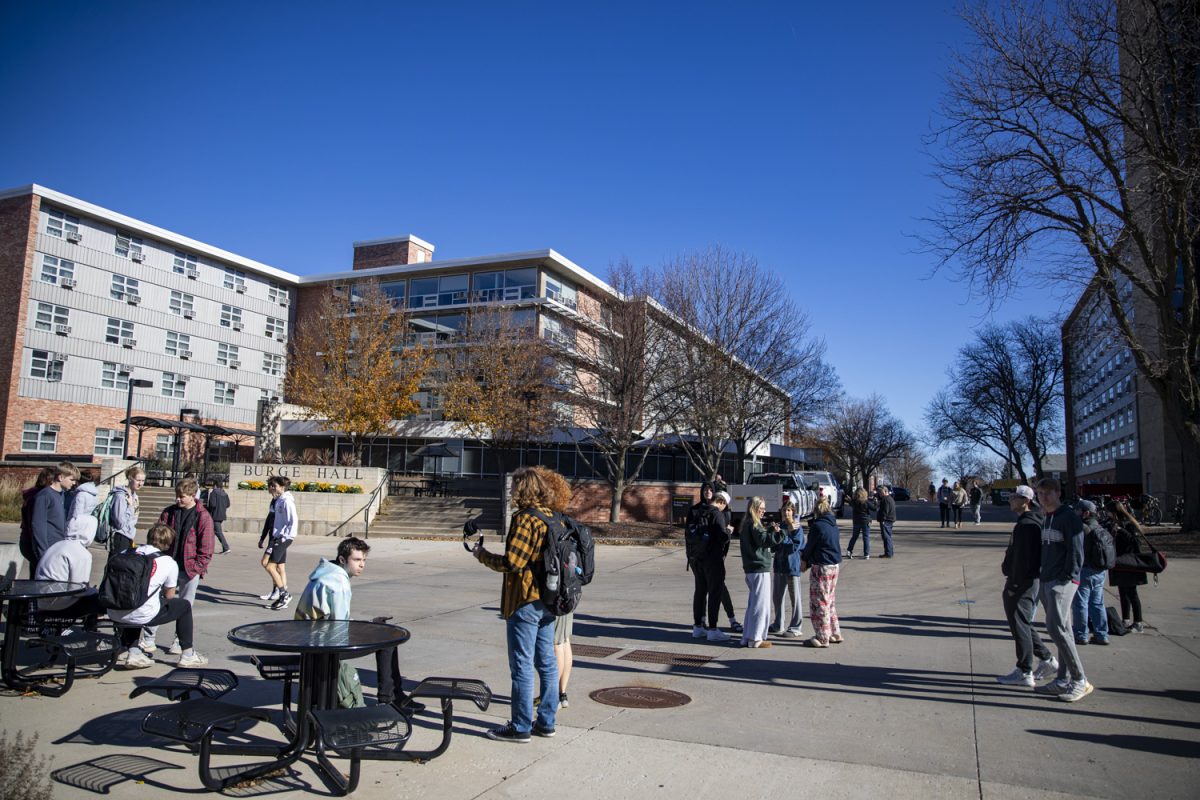Students+stand+outside+of+Burge+Residence+Hall+during+an+evacuation+at+Burge+Residence+Hall+on+the+University+of+Iowa+campus+in+Iowa+City+on+Friday%2C+Nov.+17%2C+2023.+A+Hawk+Alert+was+issued+at+11%3A29+a.m.+to+evacuate+the+building+due+to+a+suspicious+package.+Another+Hawk+Alert+was+issued+at+12%3A06+p.m.+stating+the+the+issue+was+resolved.+
