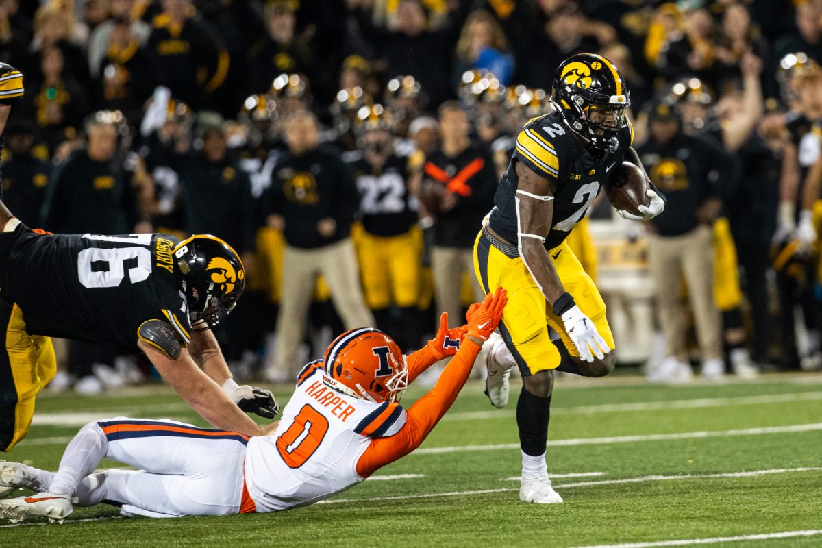 Iowa running back Kaleb Johnson carries the ball during a football game between Iowa and Illinois at Kinnick Stadium on Saturday, Nov. 18, 2023. The Hawkeyes defeated the Fighting Illini, 15-13. 