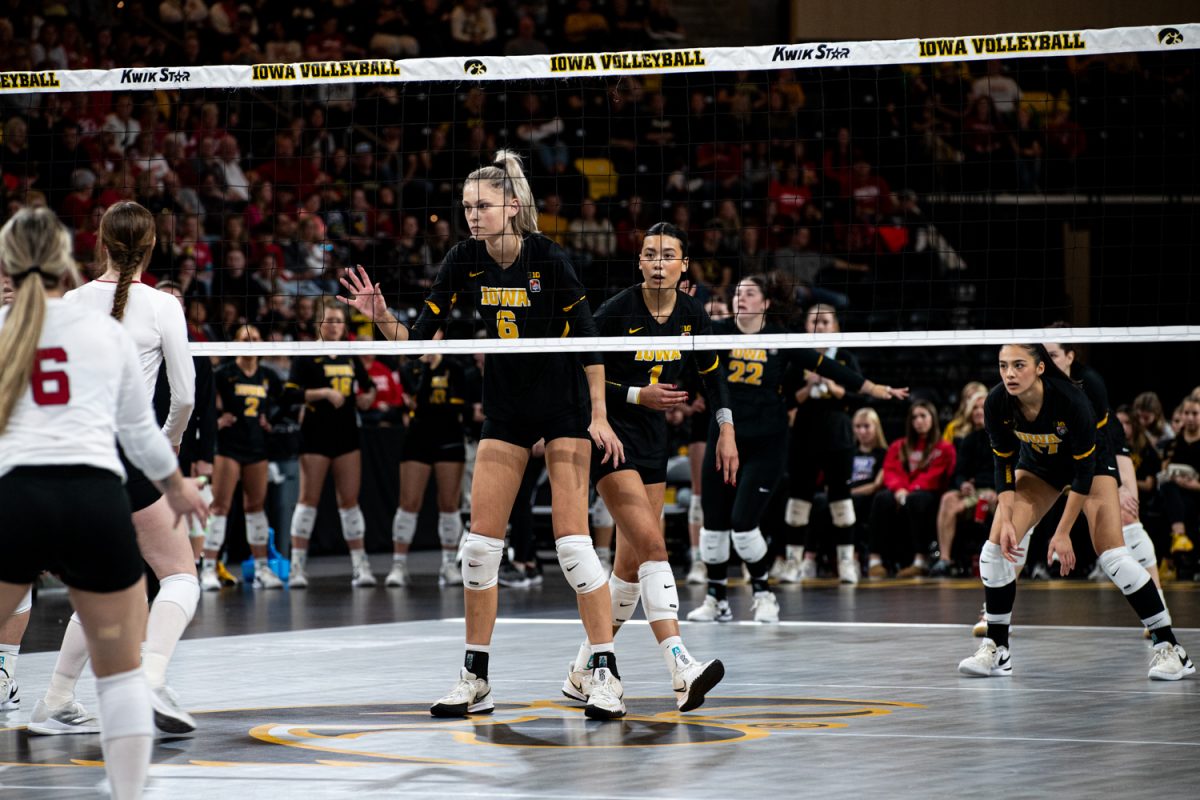 Iowa middle hitter Delaney McSweeney (6) observes the other team during a volleyball match between Iowa and Nebraska at Xtream Arena in Coralville on Sunday, Nov. 19, 2023. 