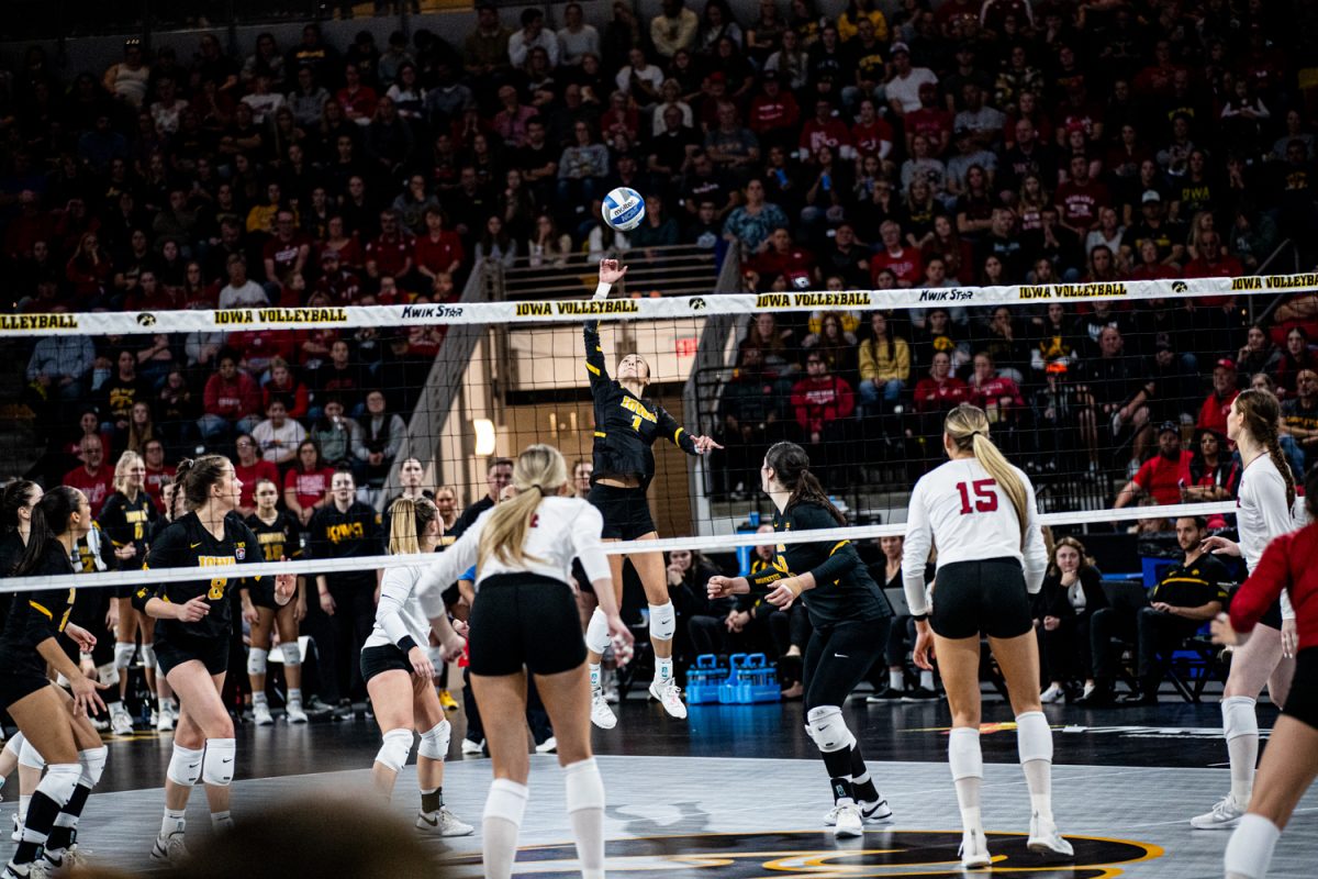 Iowa outside hitter Nataly Moravec (1) attempts to spike the ball during a volleyball match between Iowa and Nebraska at Xtream Arena in Coralville on Sunday, Nov. 19, 2023. 