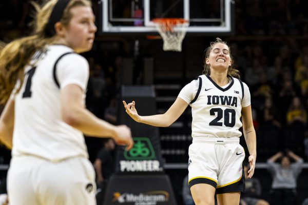 Iowa guard Kate Martin celebrates scoring a three-pointer during a basketball game between No. 2 Iowa and Drake at Carver-Hawkeye Arena in Iowa City on Sunday, Nov. 19, 2023. 