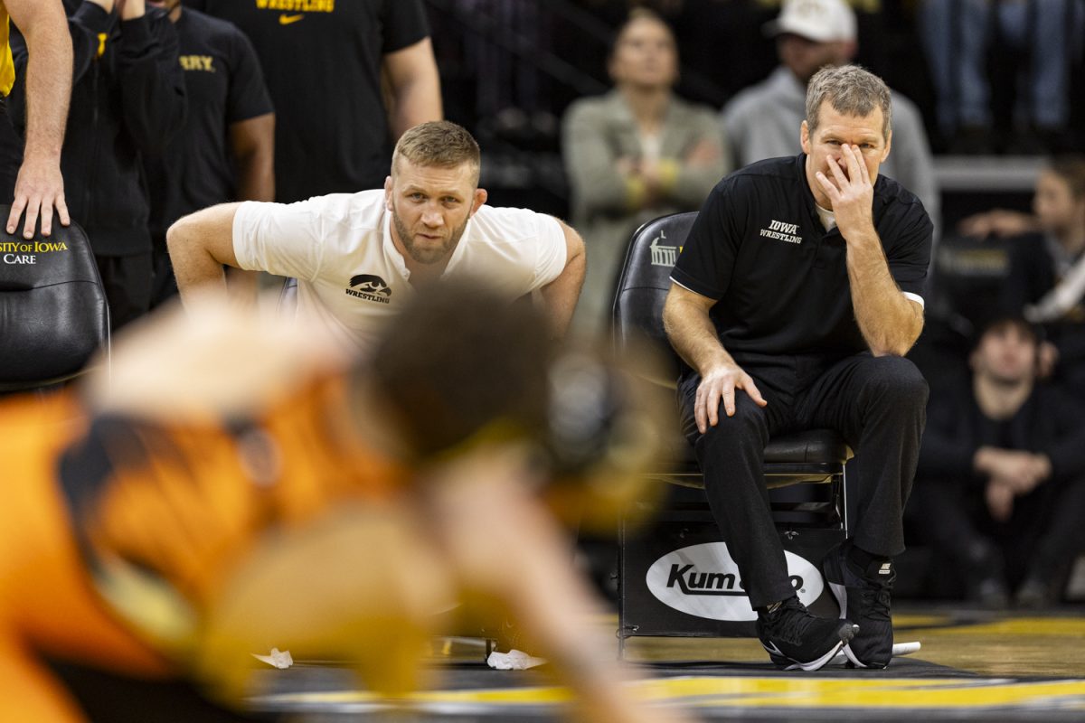 Iowa+assistant+coach+Ryan+Morningstar+and+head+coach+Tom+Brands+watch+a+match+between+Oregon+State%E2%80%99s+No.+22+133-pound+Gabe+Whisenhunt+and+Iowa%E2%80%99s+No.+9+133-pound+Brody+Teske+during+a+men%E2%80%99s+wrestling+dual+between+No.+3+Iowa+and+No.+16+Oregon+State+at+Carver-Hawkeye+Arena+on+Sunday%2C+Nov.+19%2C+2023.+Teske+defeated+Whisenhunt+by+major+decision%2C+18-8.+The+Hawkeyes+defeated+the+Beavers%2C+25-11.