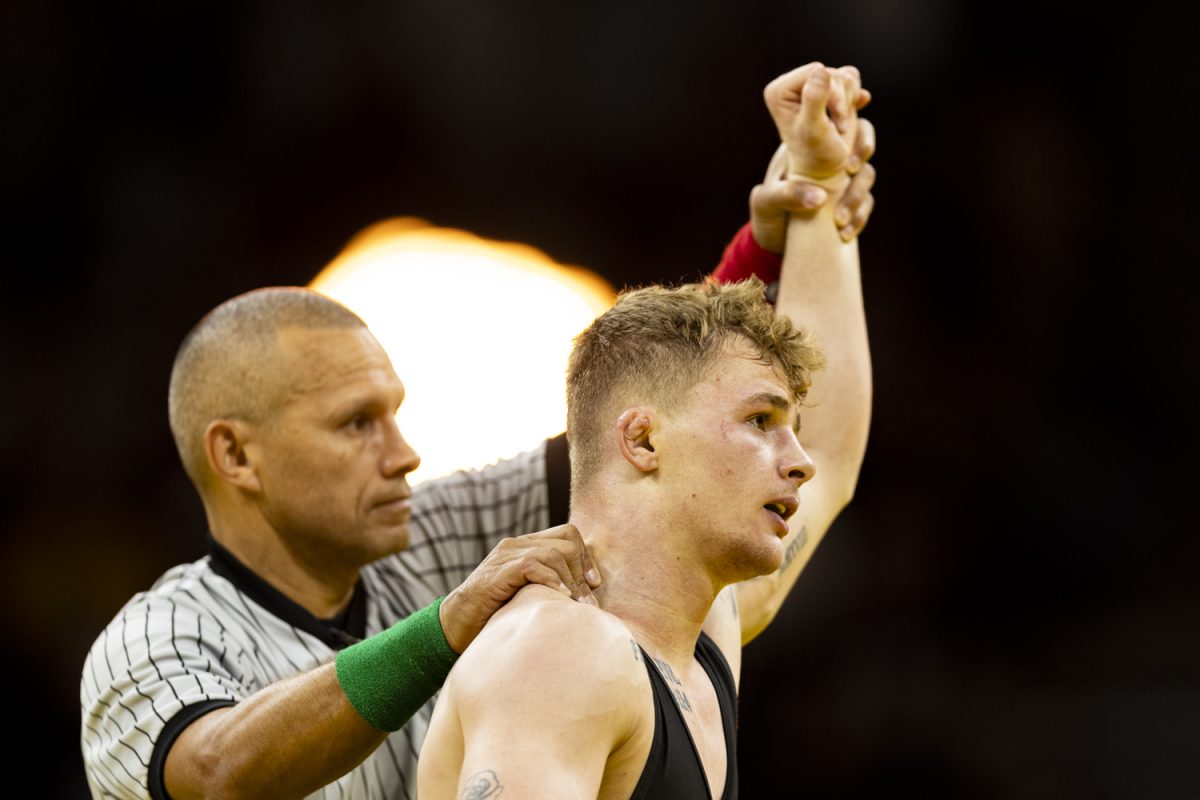Iowa%E2%80%99s+No.+9+133-pound+Brody+Teske+looks+to+the+crowd+while+getting+his+hand+raised+after+wrestling+Oregon+State%E2%80%99s+No.+22+Gabe+Whisenhunt+during+a+men%E2%80%99s+wrestling+dual+between+No.+3+Iowa+and+No.+16+Oregon+State+at+Carver-Hawkeye+Arena+on+Sunday%2C+Nov.+19%2C+2023.+Teske+defeated+Whisenhunt+by+major+decision%2C+18-8.+The+Hawkeyes+defeated+the+Beavers%2C+25-11.