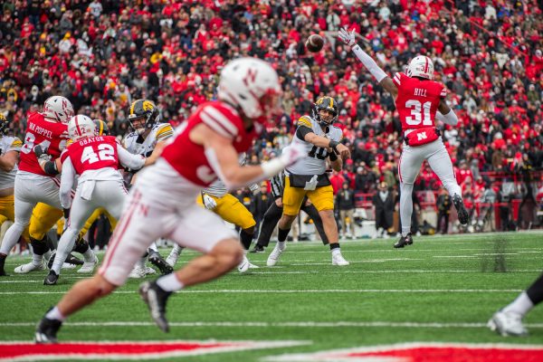 Iowa quarterback Deacon Hill throws the ball down the field during a football game between No. 17 Iowa and Nebraska at Memorial Stadium in Lincoln Nebraska on Friday, Nov. 23, 2023. The Hawkeyes defeated the Cornhuskers 13-10.