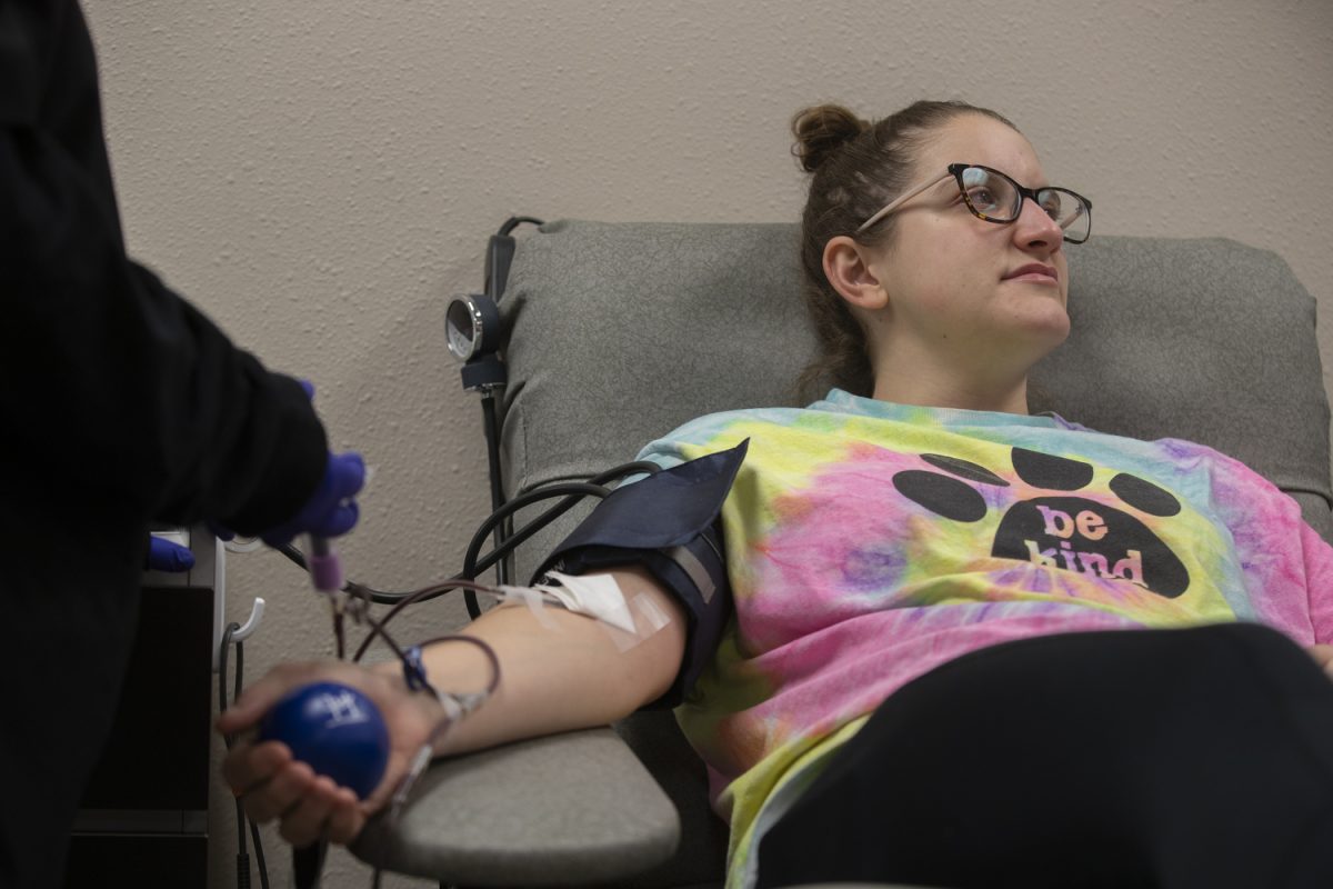 Kaitlyn Clark donates blood at Impact Life in Coralville on Nov. 25, 2023. Impact life receives about 228,000 blood donations a year. 