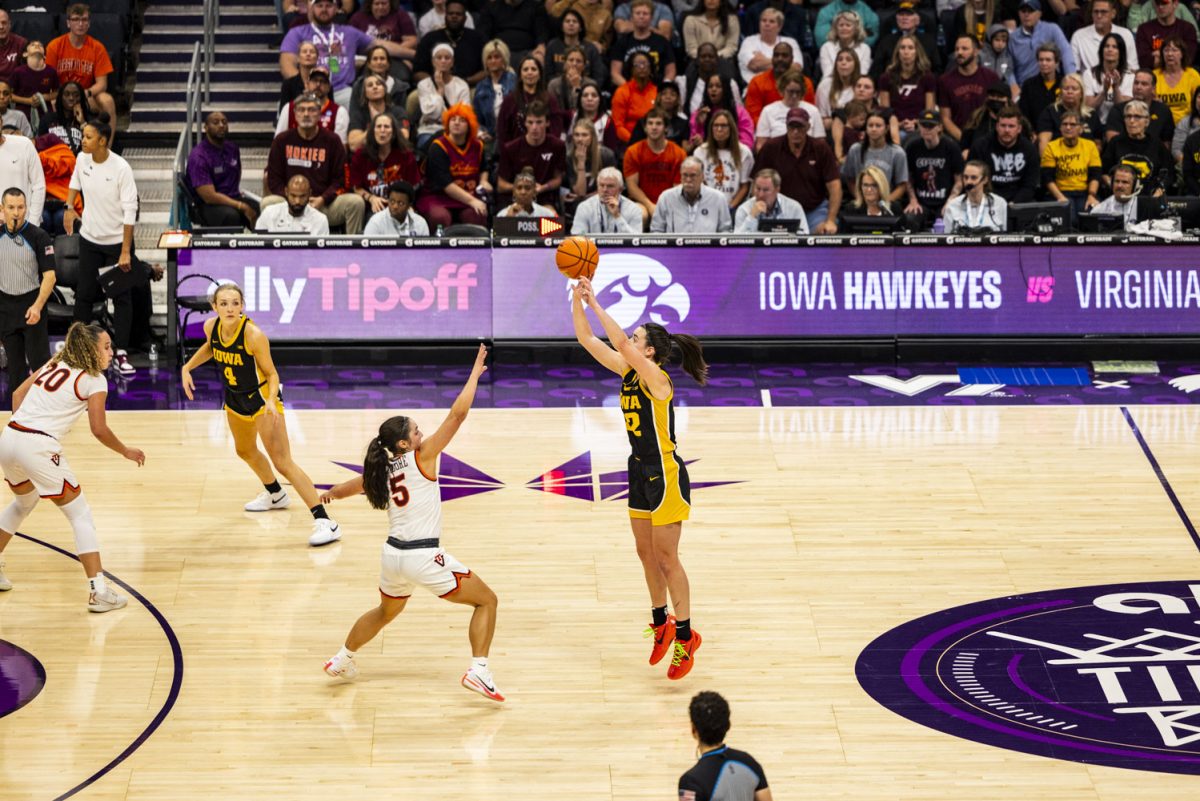 Iowa guard Caitlin Clark shoots a 3-pointer during the Ally Tipoff, a basketball game between No. 3 Iowa and No. 8 Virginia Tech at Spectrum Arena in Charlotte, N.C., on Thursday, Nov. 9, 2023. 