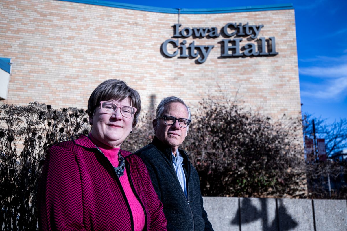 Iowa City City Councilors Pauline Taylor and John Thomas pose for a portrait outside of Iowa City City Hall in Iowa City on Wednesday, Nov. 29, 2023. 