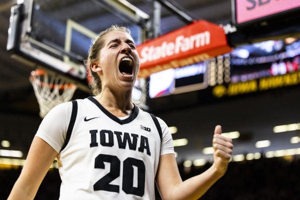 Iowa guard Kate Martin celebrates after blocking a shot during a basketball game between No. 4 Iowa and Bowling Green at Carver-Hawkeye Arena in Iowa City on Saturday, Dec. 2, 2023. 