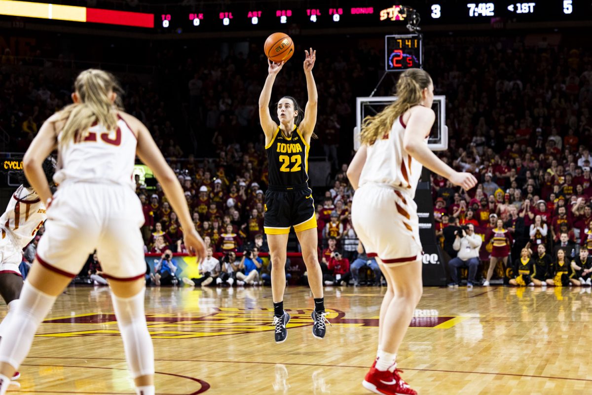 Iowa+guard+Caitlin+Clark+shoots+a+three-pointer+during+the+Iowa+Corn+Cy-Hawk+Series%2C+a+basketball+game+between+No.+4+Iowa+and+Iowa+State%2C+at+a+sold-out+Hilton+Coliseum+in+Ames%2C+Iowa%2C+on+Wednesday%2C+Dec.+6%2C+2023.+