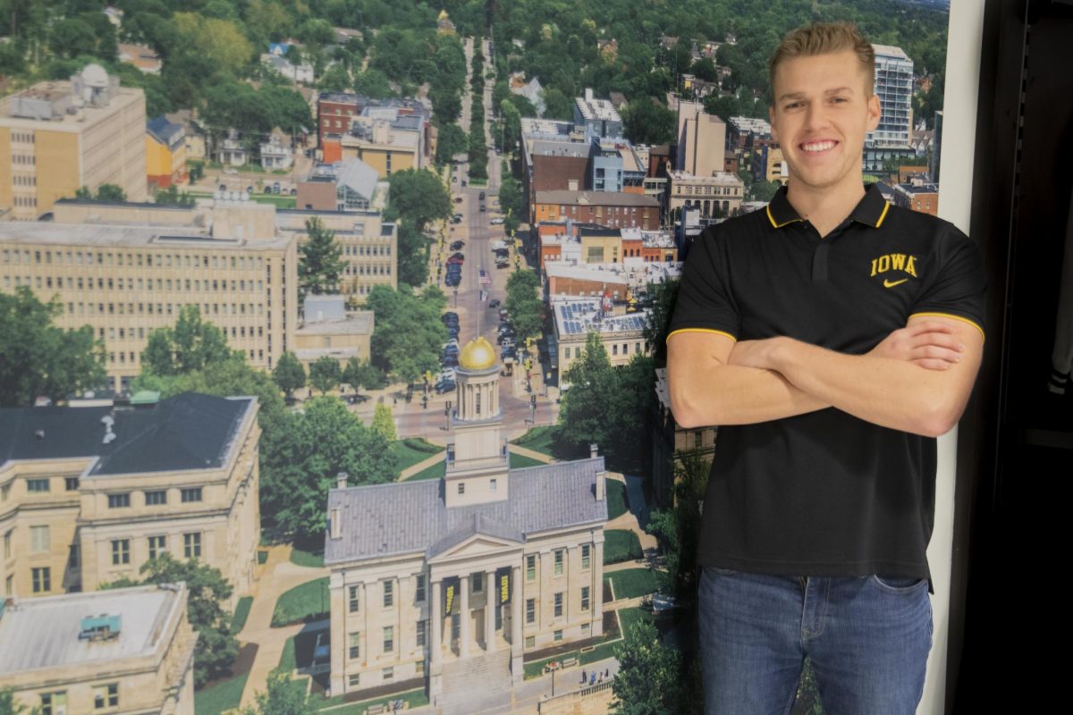 Hawkeye Marching Band Drum Major Christian Frankl poses for a portrait in the Iowa Memorial Union. Frankl is in his fifth and final year at the University of Iowa and graduated in December.