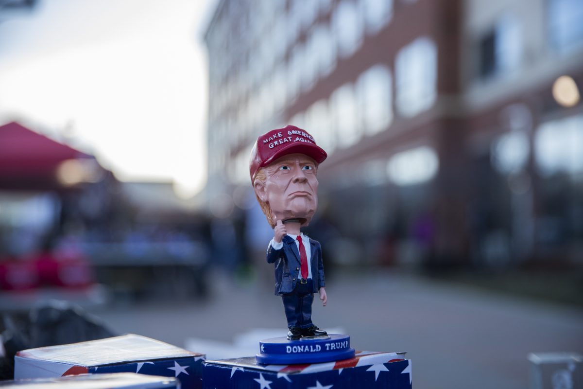 A Donald Trump bobble head is seen before a campaign event with 2024 presidential candidate Donald Trump at the Hyatt Regency in Coralville on Wednesday, Dec. 13, 2023. Doors open at 3 p.m., with the former President expected to speak around 6 p.m..