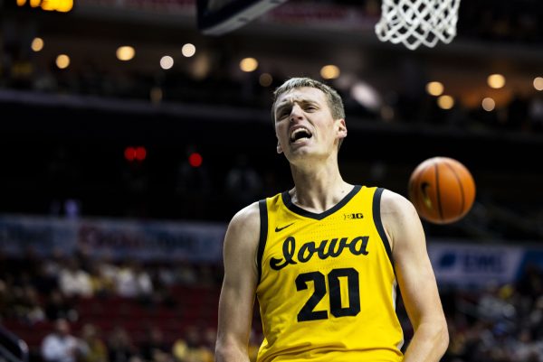 Iowa forward Payton Sandfort celebrates during game one of the Hy-Vee Hawkeye Showcase between Iowa men’s basketball and Florida A&M at Wells Fargo Arena in Des Moines, Iowa, on Saturday, Dec. 16, 2023. The Hawkeyes defeated the Rattlers 88-52.