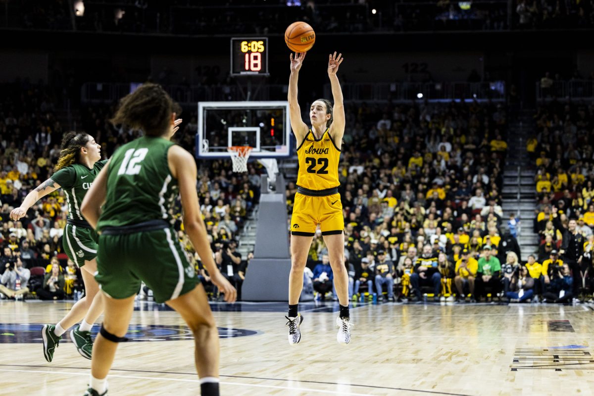 Iowa guard Caitlin Clark shoots a three-pointer during game two of the Hy-Vee Hawkeye Showcase between No. 4 Iowa women’s basketball and Cleveland State at Wells Fargo Arena in Des Moines, Iowa, on Saturday, Dec. 16, 2023. Clark shot 9-of-16 in 3-pointers. The Hawkeyes defeated the Vikings, 104-75.