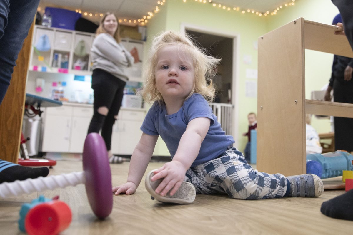 A child plays at the Arc of Southeast Iowa’s Bill Reagan Children’s Center in Iowa City on Friday, Dec. 1, 2023. The children’s center serves children ages 3 months to 5 years.
