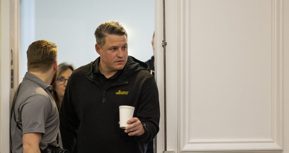 Iowa offensive coordinator Brian Ferentz walks into a press conference for the 2024 Cheez-It Citrus Bowl at the Rosen Plaza Hotel in Orlando, Fla., on Friday, Dec. 29, 2023. Ferentz met with members of the media ahead of his last game with the Hawkeyes on New Year’s Day at 1 p.m. ET.