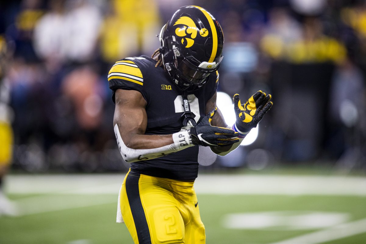 Iowa+running+back+Kaleb+Johnson+claps+during+warmup+before+a+football+game+between+No.+18+Iowa+and+No.+2+Michigan+at+Lucas+Oil+Stadium+in+Indianapolis+on+Saturday%2C+Dec.+2%2C+2023.+%28Cody+Blissett%2FThe+Daily+Iowan%29