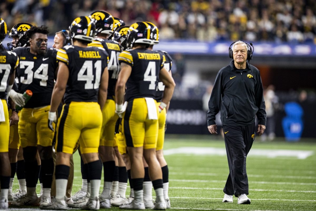 Iowa head coach Kirk Ferentz walks on the sideline during a football game between No. 18 Iowa and No. 2 Michigan at Lucas Oil Stadium in Indianapolis on Saturday, Dec. 2, 2023. The Wolverines lead the Hawkeyes, 10-0, after the first half (Cody Blissett/The Daily Iowan)
