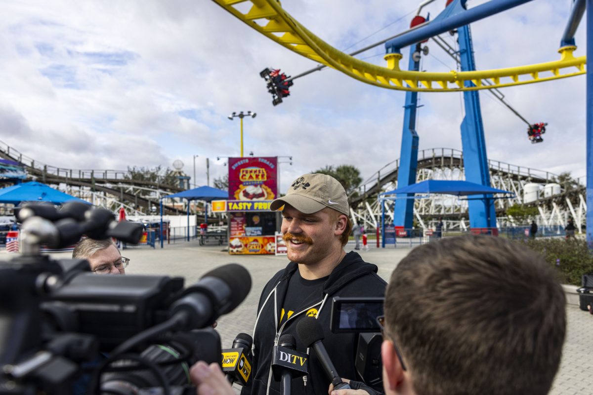 Iowa offensive lineman Gennings Dunker answers questions during Day for Kids, an event for the 2024 Cheez-It Citrus Bowl, at Fun Spot America in Orlando, Fla., on Saturday, Dec. 30, 2023. Iowa and Tennessee met with children and enjoyed a morning of roller coasters and rides at the amusement park. The teams match up at Camping World Stadium on Monday, Jan. 1, at noon CT.