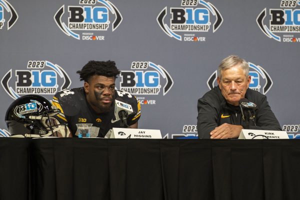 Iowa Head Coach Kirk Ferentz and Iowa linebacker Jay Higgins speak in a press confrence after the Big Ten football championship game between No.18 Iowa and No. 2 Michigan at Lucas Oil Stadium in Indianapolis on Saturday, Dec. 2, 2023. The Wolverines defeated the Hawkeyes 26-0.