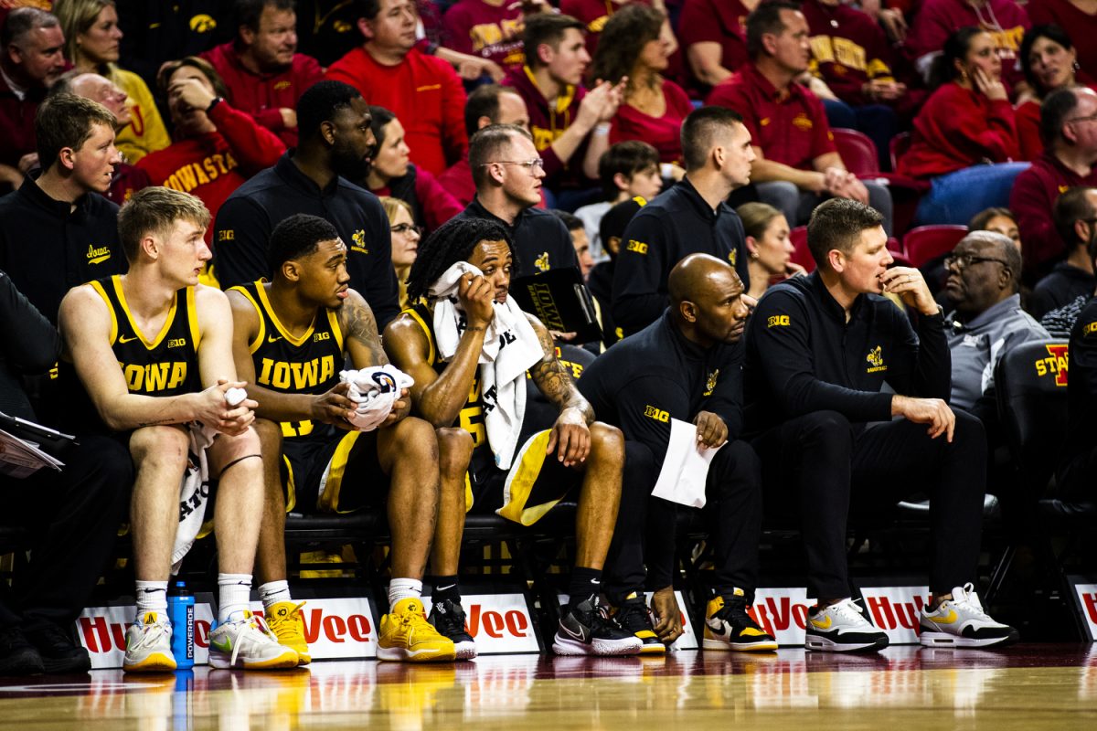 Iowa+players+and+coaches+observe+a+basketball+game+between+Iowa+and+Iowa+State+at+Hilton+Coliseum+in+Ames%2C+Iowa+on+Thursday%2C+Dec.+7%2C+2023.+The+Cyclones+defeated+the+Hawkeyes%2C+90-65.