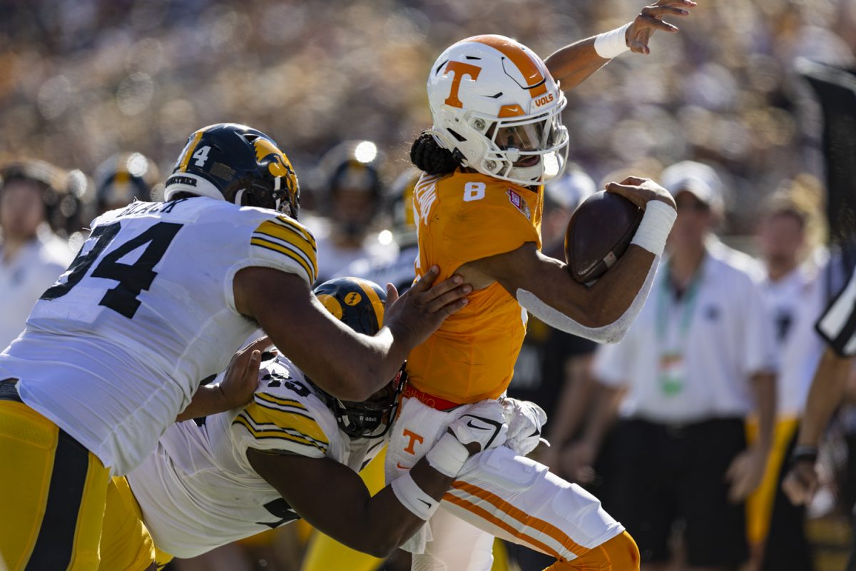 Tennessee quarterback Nico Iamaleava carries the ball during the 2024 Cheez-It Citrus Bowl between No. 17 Iowa and No. 21 Tennessee at Camping World Stadium in Orlando, Fla., on Monday, Jan. 1, 2024. (Ayrton Breckenridge/The Daily Iowan)