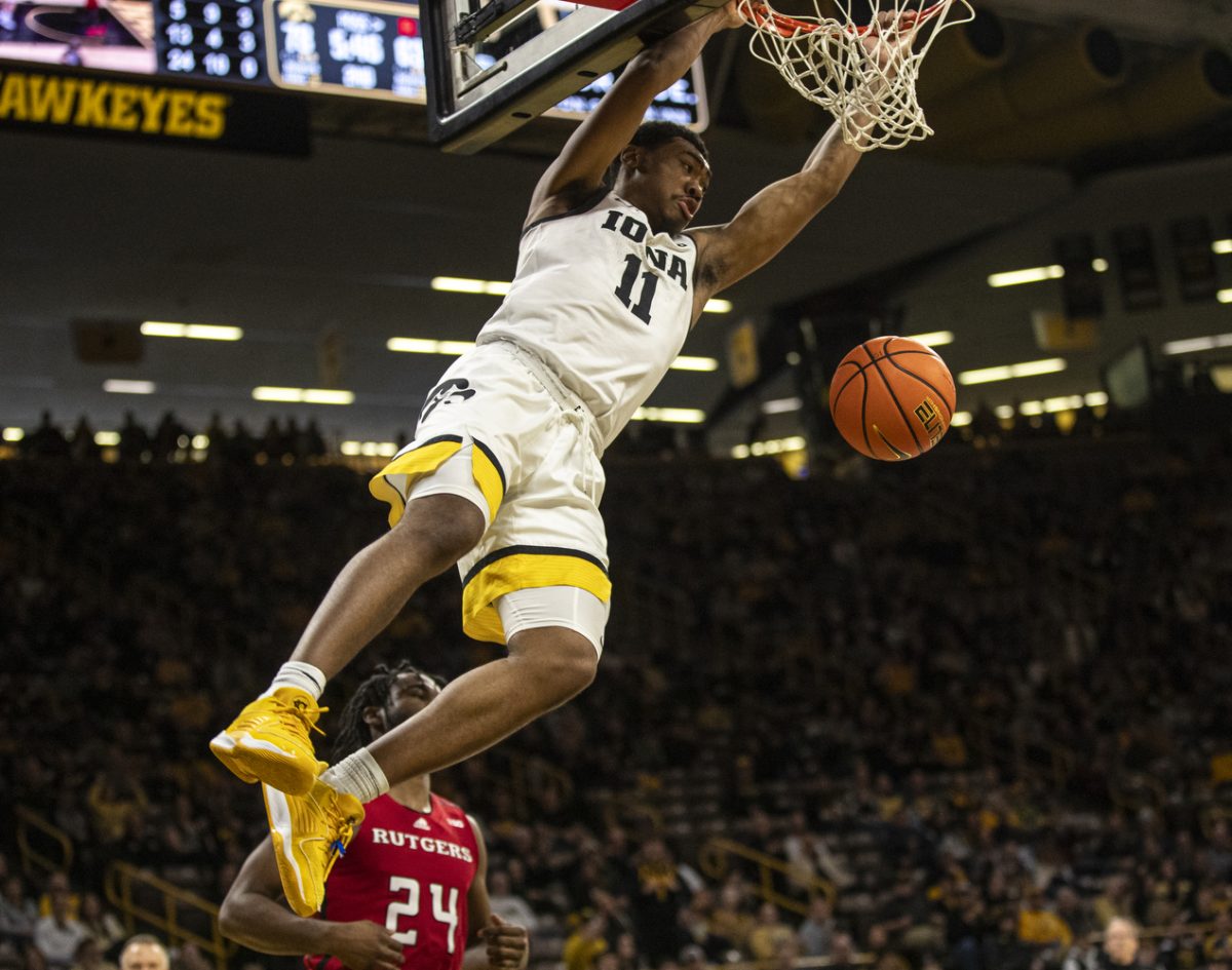 Iowa Guard Tony Perkins dunks the ball during a men’s basketball game between Iowa and Rutgers at Carver-Hawkeye Arena on Friday, Jan. 6. The Hawkeyes defeated the Scarlet Knights, 86-77. Perkins had 15 points during the game.