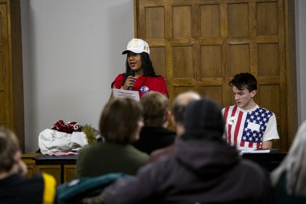 Caucusgoer Jasmyn Jordan speaks in support of Former President Donald Trump and 2024 Presidential Candidate during the Iowa caucuses at the Iowa Memorial Union on Monday, Jan. 15th, 2024. (Carly Schrum/The Daily Iowan)