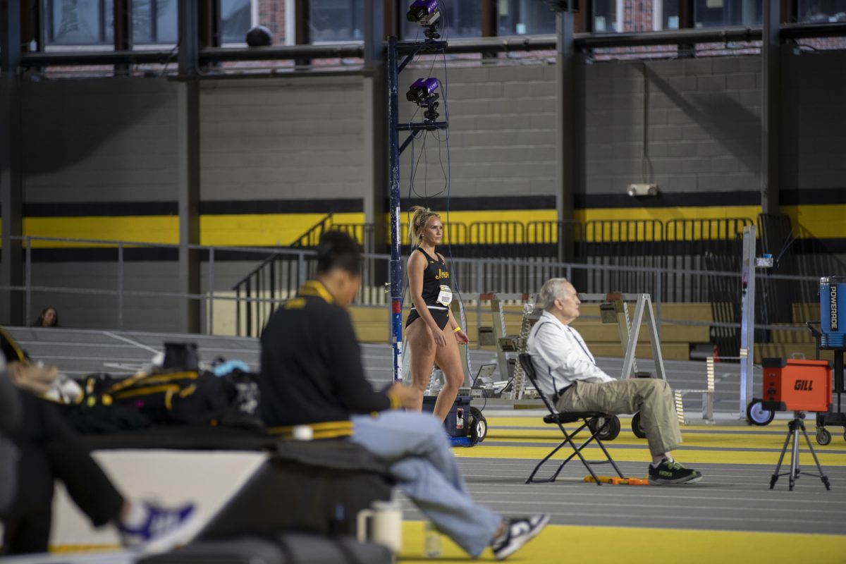Isabelle Woody during the Jimmy Grant Invitational at the Hawkeye indoor track facility on Saturday, Dec. 9, 2023. Woody is a  sophomore and is a recent transfer from University of California Santa Barbara. 