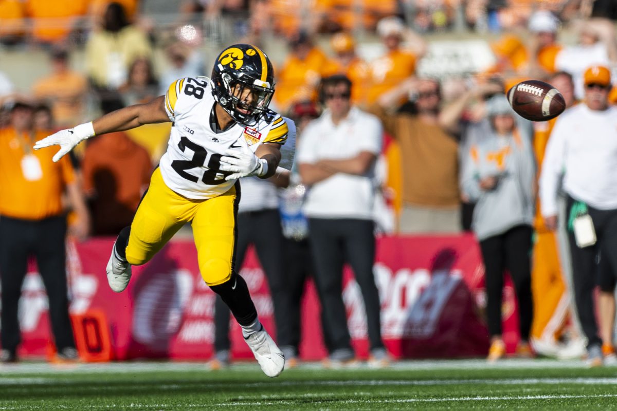 Iowa running back Kamari Moulton attempts to catch a pass during the 2024 Cheez-It Citrus Bowl between No. 17 Iowa and No. 21 Tennessee at Camping World Stadium in Orlando, Fla., on Monday, Jan. 1, 2024. The Volunteers defeated the Hawkeyes, 35-0.