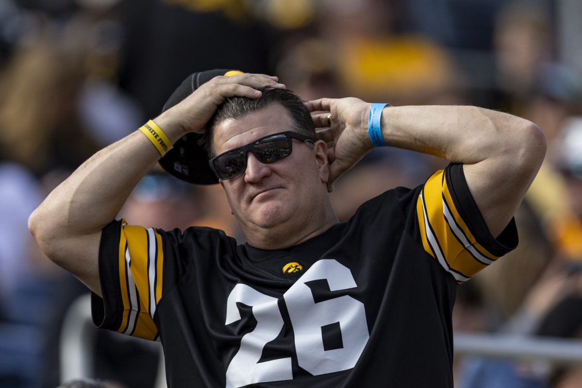 An Iowa fan reacts to action during the 2024 Cheez-It Citrus Bowl between No. 17 Iowa and No. 21 Tennessee at Camping World Stadium in Orlando, Fla., on Monday, Jan. 1, 2024. The Volunteers defeated the Hawkeyes, 35-0. 