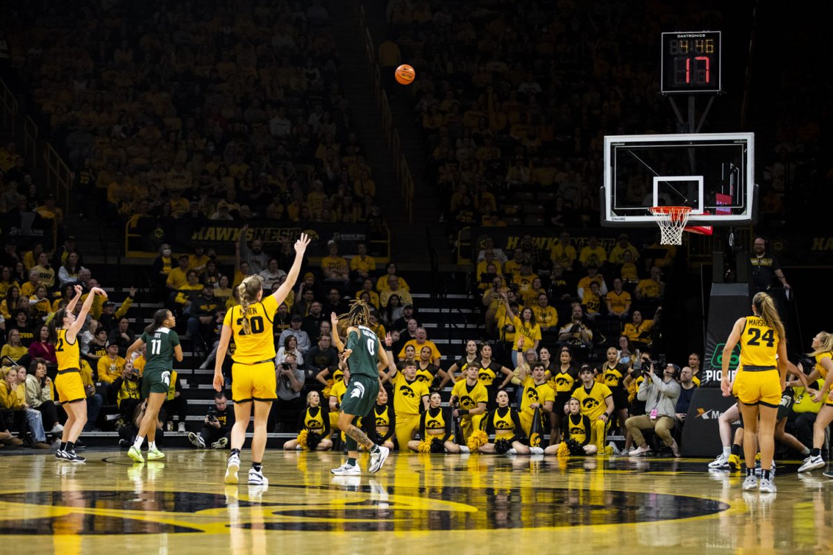 Iowa guard Caitlin Clark shoots a three-pointer during a women’s basketball game between No. 4 Iowa and Michigan State in a sold-out Carver-Hawkeye Arena on Tuesday, Jan. 2, 2023.