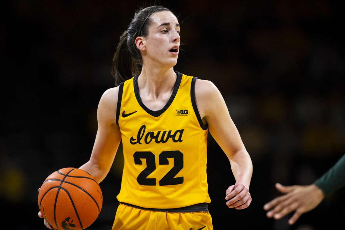 Iowa guard Caitlin Clark dribbles the ball up the court during a women’s basketball game between No. 4 Iowa and Michigan State in a sold-out Carver-Hawkeye Arena on Tuesday, Jan. 2, 2023.