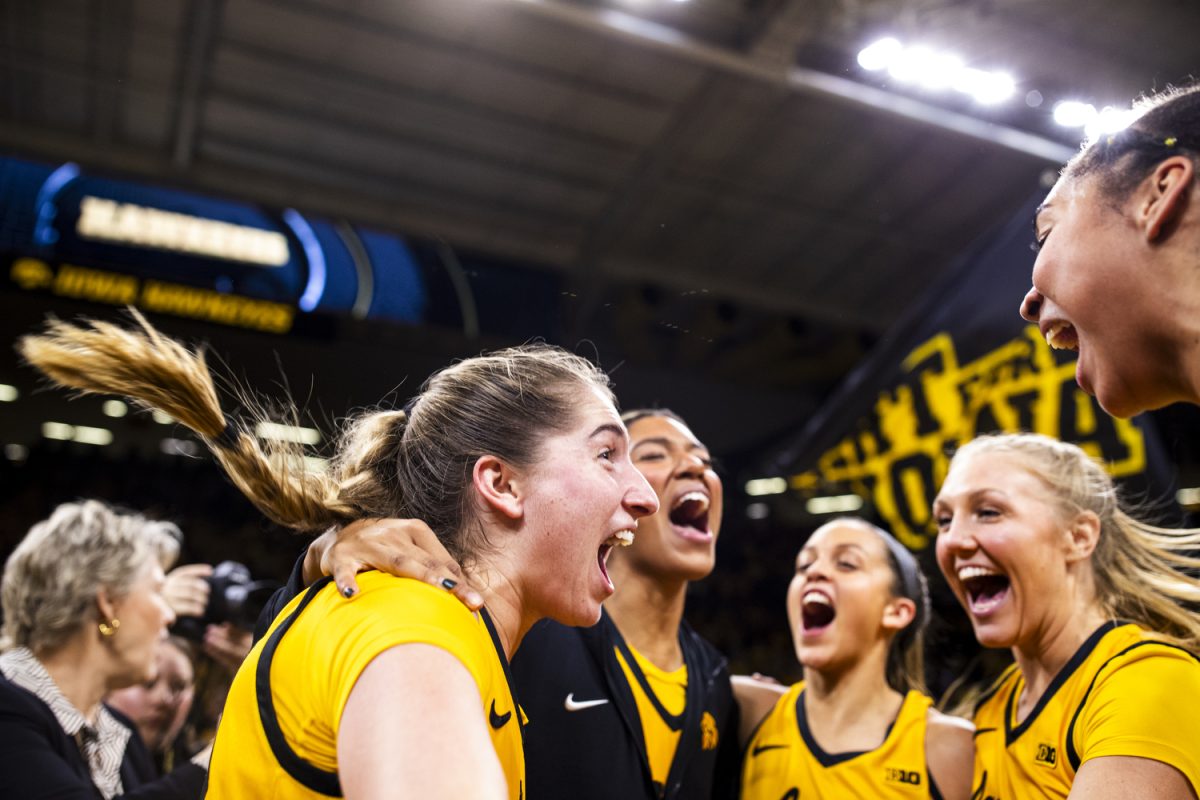 Iowa players celebrate following a women’s basketball game between No. 4 Iowa and Michigan State at Carver-Hawkeye Arena on Tuesday, Jan. 2, 2024. The Hawkeyes continue a Big Ten-best 11-game winning streak. The Hawkeyes defeated the Spartans, 76-73.