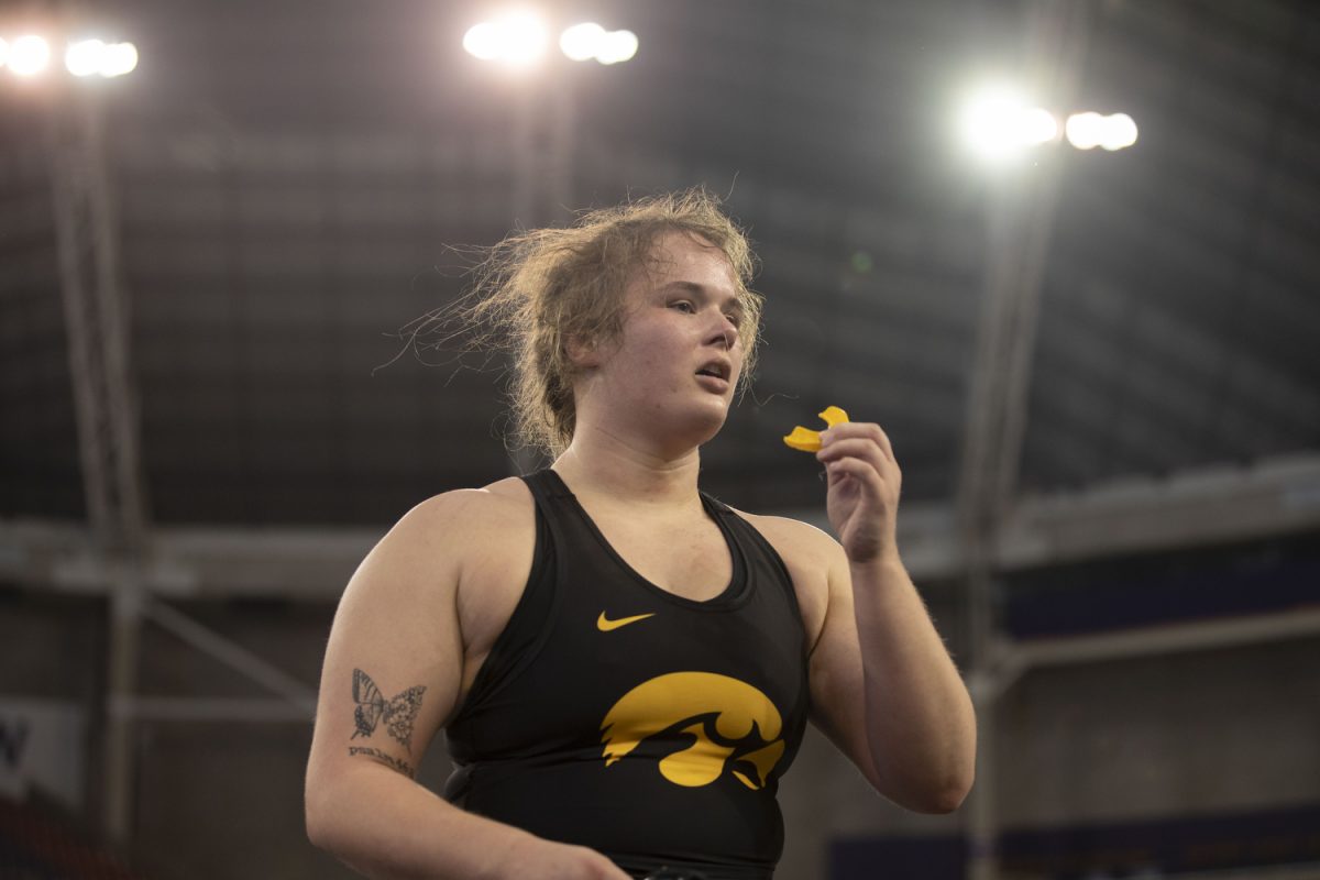 Iowa 191-pound Jaycee Foeller walks off the mat during the finals round of the NWCA National Duals between No. 2 Iowa and North Central College on Saturday, Jan. 6, 2024. Iowa defeated North Central College , 21-20. (Isabella Tisdale/The Daily Iowan)