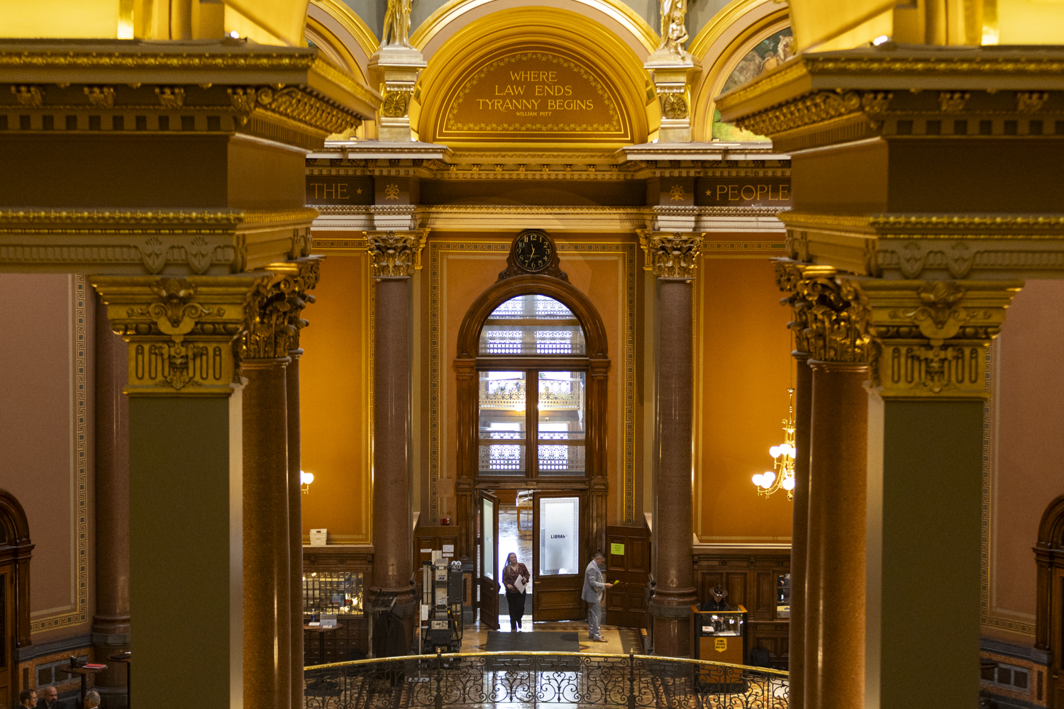 A person exits the State Law Library during the first day of the 2024 Iowa legislative session at the Iowa State Capitol in Des Moines on Monday, Jan. 8, 2024. The Republicans have 64 seats in the house and the Democrats have 36.