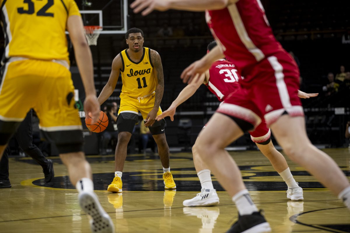 Iowa guard, Tony Perkins dribbles the ball during a men’s basketball game between Iowa and Nebraska at Carver-Hawkeye Arena on Friday, Jan. 12, 2024. The Hawkeyes defeated the Cornhuskers, 94-76. 