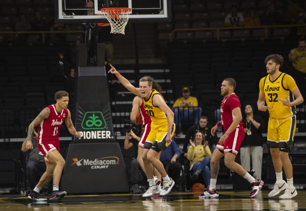 Iowa forward, Payton Sandfort celebrates a point during a men’s basketball game between Iowa and Nebraska at Carver-Hawkeye Arena on Friday, Jan. 12, 2024. The Hawkeyes defeated the Cornhuskers, 94-76. 