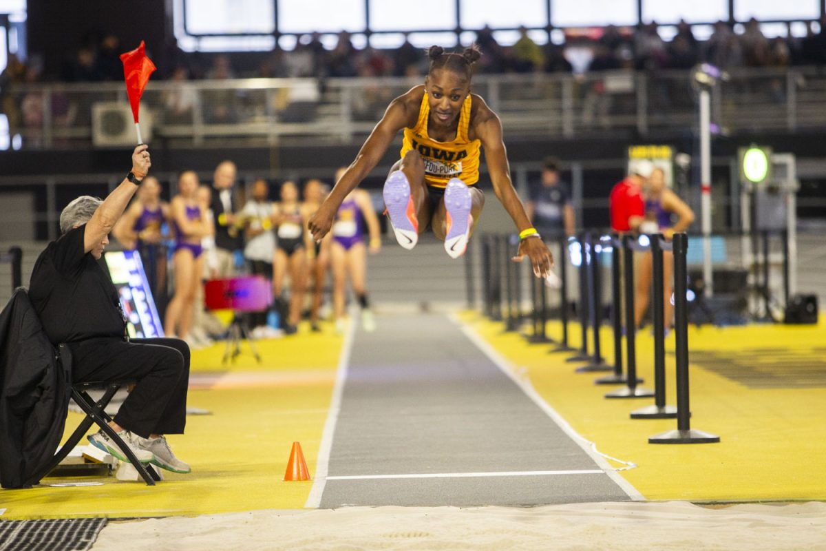 Iowa’s Maud Zeffou-Poaty competes in long jump during the 2024 Hawkeye Invitational at the Hawkeye Indoor Track Facility on Saturday, Jan. 13, 2024. The Hawkeyes hosted ten schools to compete in a variety of field and running events.