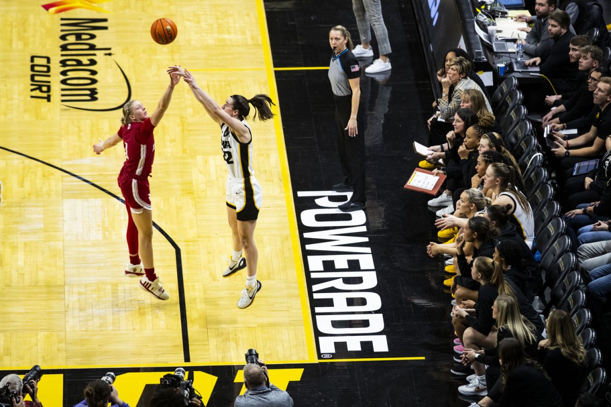 Iowa guard Caitlin Clark shoots a 3-pointer during a women’s basketball game between No. 3 Iowa and No. 14 Indiana at Carver-Hawkeye Arena in Iowa City on Saturday, Jan. 13, 2024. Clark played for 33 minutes and 44 seconds, shooting 6-of-16 in 3-pointers. The Hawkeyes defeated the Hoosiers, 84-57.