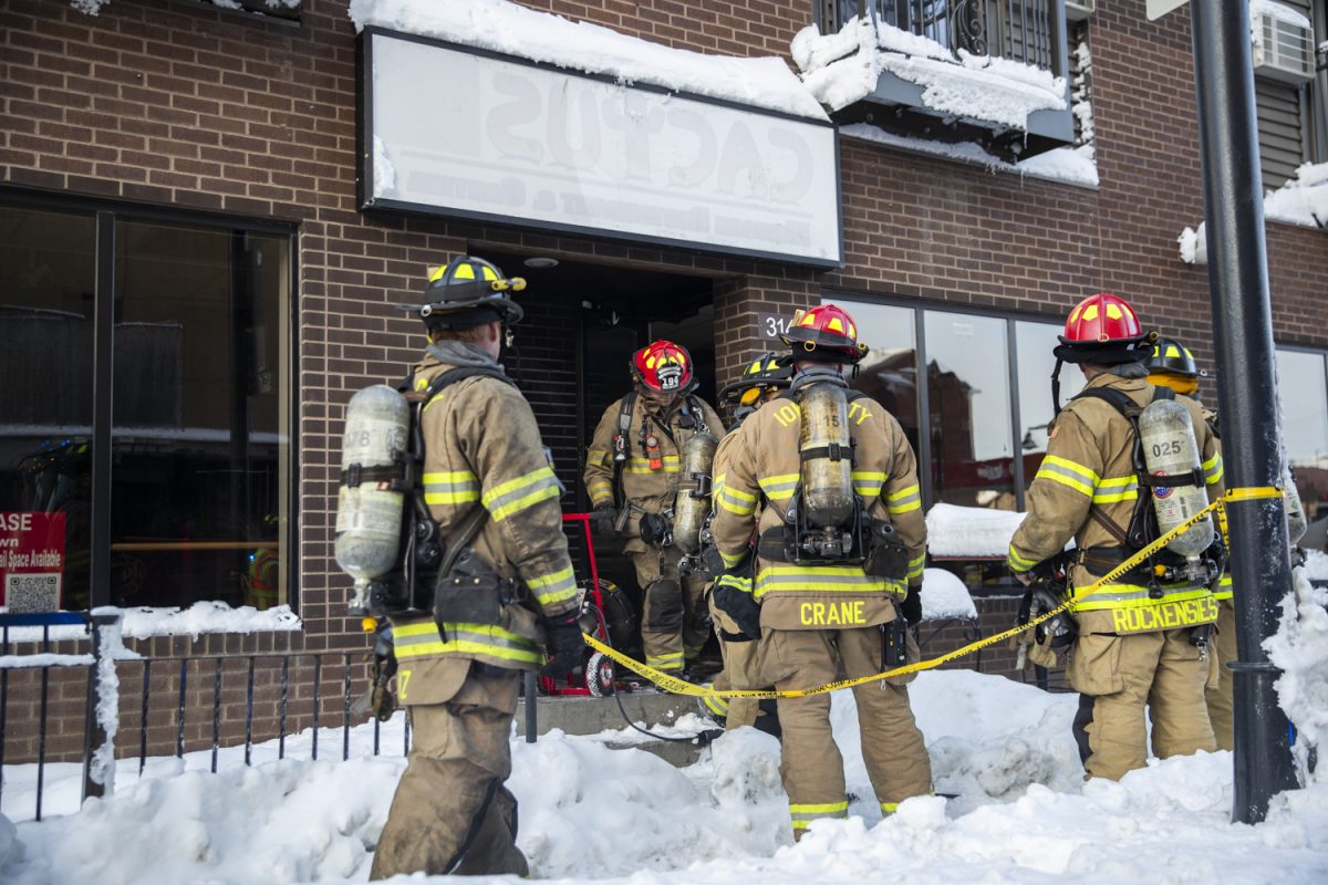 The Iowa City Fire Department responds to a fire at 316 E. Burlington St. in Iowa City on Wednesday, Jan. 17, 2024.
