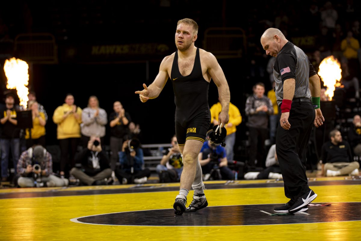 Iowa%E2%80%99s+No.+9+174-pound+Patrick+Kennedy+points+toward+the+crowd+during+a+wrestling+dual+between+No.+3+Iowa+and+Purdue+at+Carver-Hawkeye+Arena+on+Friday%2C+Jan.+19%2C+2024.+The+Hawkeyes+defeated+the+Boilermakers%2C+34-6.+Kennedy+defeated+Baumann+by+technical+fall%2C+19-4.
