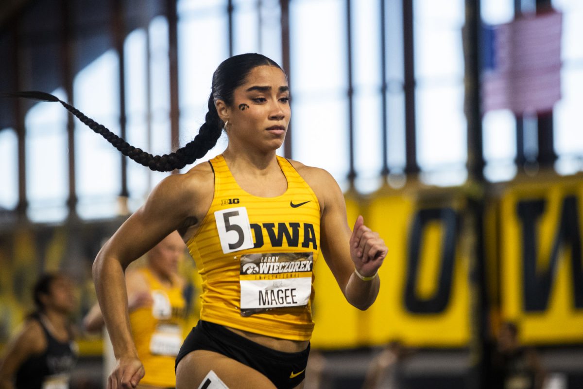 Iowa’s Paige Magee competes in the 60-meter hurdle during the Larry Wieczorek Invitational at the Hawkeye Indoor Track Facility in Iowa City on Saturday, Jan. 20, 2024. Magee set a new personal and school record of 8.00.