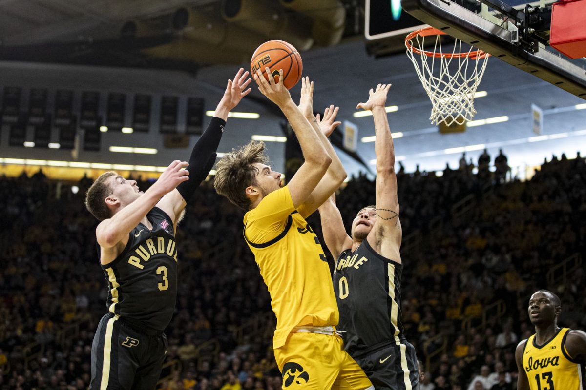 Iowa+Forward+Owen+Freeman+goes+up+for+a+layup+during+a+men%E2%80%99s+basketball+game+between+No.+2+Purdue+and+Iowa+at+Carver-Hawkeye+Arena+on+Saturday%2C+Jan.+20%2C+2024.+The+Boilermakers+defeated+the+Hawkeyes%2C+84-70.+Freeman+had+6+points+and+4+fouls+during+the+game.